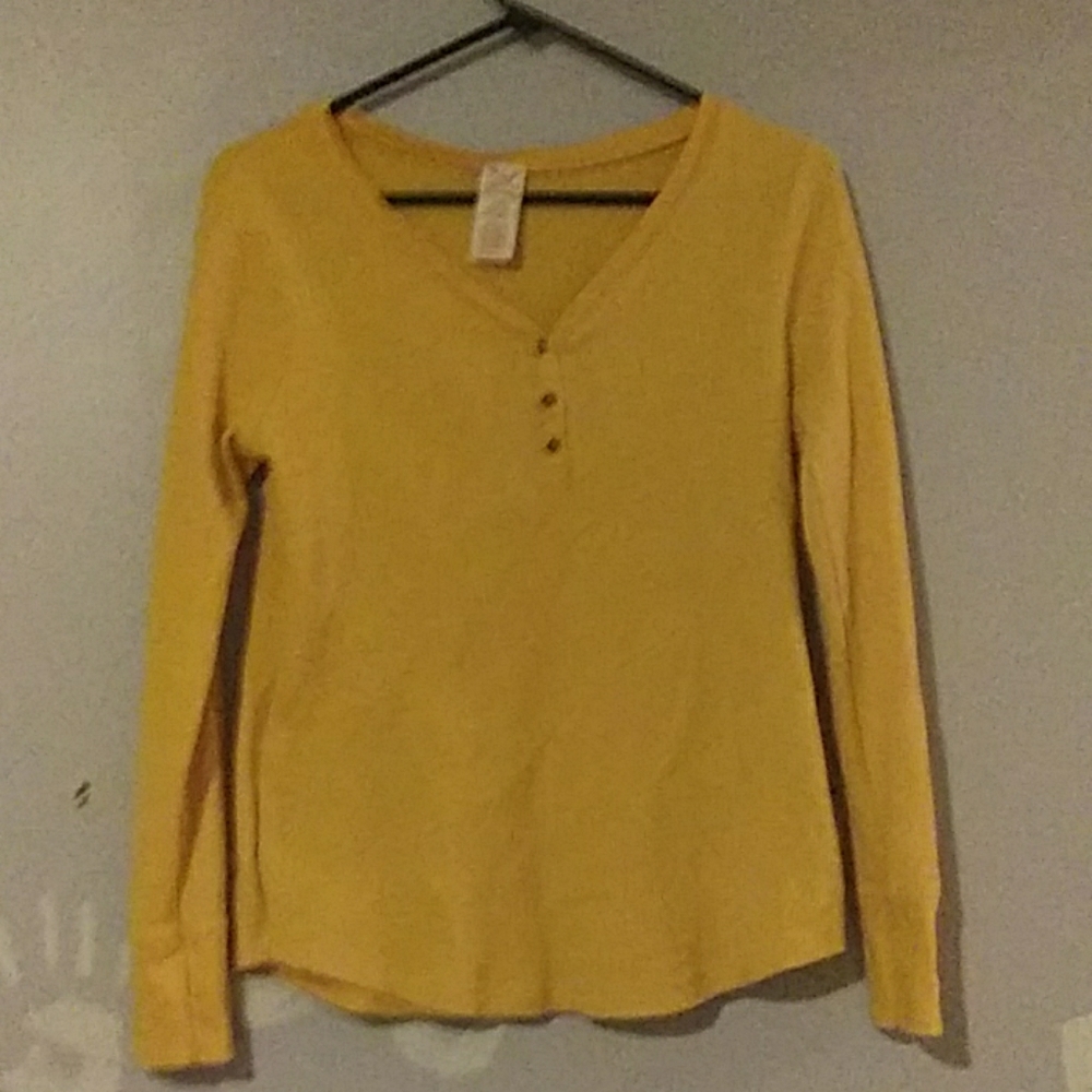 This is a yellow, long sleeve shirt